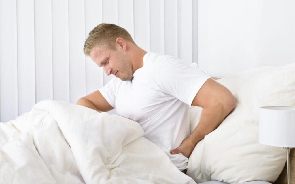 How can a bad back affect your sleep?