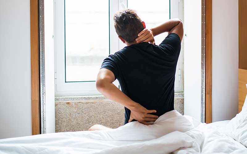 Can a mattress make lower back pain worse?